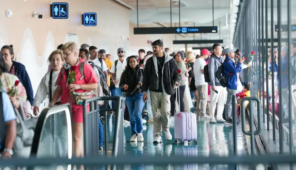 "Tourists arriving in the Maldives"