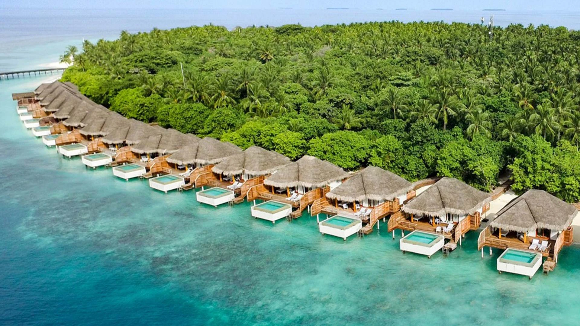 Overwater villa exterior at Dusit Thani Maldives, Baa Atoll
