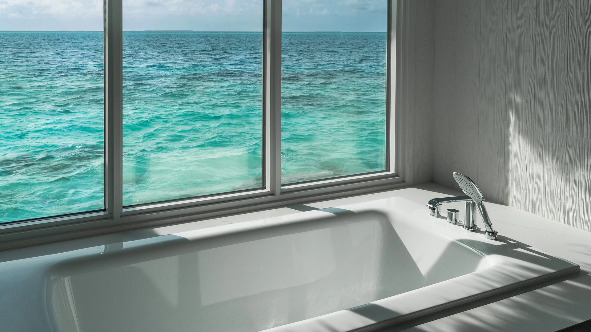 Sun Siyam Vilu Reef  — Two Bedroom Ocean Signature Villa with Pool + Slide