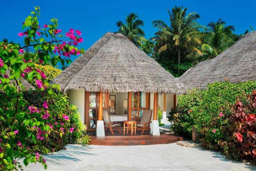 Sheraton Maldives Full Moon Resort & Spa — Island / Beachfront Cottage
