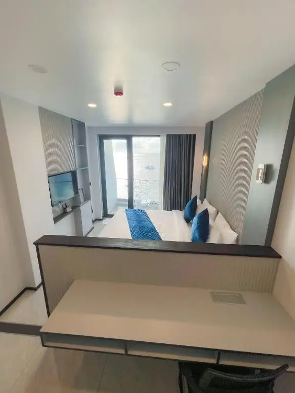 iCom Blue Sea View — Deluxe Family Room with Balcony & Sea View